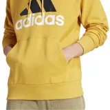 Canguro Adidas Essentials color mostaza con capucha, cordones ajustables, bolsillo tipo canguro y logo de Adidas estampado en el pecho.