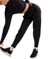 Pantalón de jogging negro de corte holgado, con cintura alta y bolsillos laterales.
