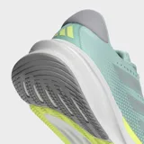 Championes de running Adidas Supernova Stride 2.0, color verde menta con detalles en amarillo neón y tres franjas plateadas. Cuentan con mediasuela híbrida Dreamstrike+ y EVA, y exterior de malla transpirable.