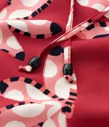 Pollera larga de viscosa con estampado floral, cintura elastizada con lazo y ruedo fruncido. Prenda plus size.