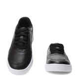 Championes Puma modelo Court Lally Feline, color negro con suela blanca y franja lateral con estampado animal print.