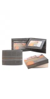 Billetera de cuero marrón claro con bordado zigzag en hilo blanco y ocre.