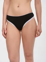 Colaless color piel con terminaciones de puntilla blanca.