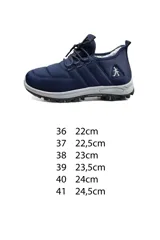 Calzado deportivo azul marino con cordones elásticos, interior forrado y suela de goma con relieve.