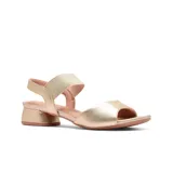 Sandalias de cuero negro con taco bajo y tira elástica en el tobillo.