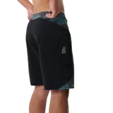 Short de baño Rip Curl modelo Sseries Trip Cordura, con estampado camuflado digital en tonos verde y gris, detalles laterales en negro y cordón ajustable en la cintura.