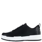 Championes urbanos N+ modelo Foge, color negro con suela de plataforma blanca. Presentan diseño con recortes, cierre mediante cordones y tirador en el talón.