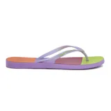 Chanclas de goma con diseño de bloques de color: naranja, lila, rojo y verde.