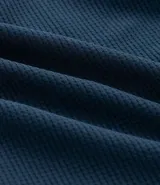 Bermuda deportiva para hombre marca Get Over, confeccionada en microfibra de poliéster. Presenta cintura elástica con cordón ajustable, bolsillos laterales y un diseño texturizado con estampa localizada.