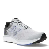 Championes de running New Balance modelo Fresh Foam 680 V7, color gris con detalles en negro y azul. Presentan capellada de malla técnica transpirable, logo N lateral con diseño moteado y entresuela con tecnología Fresh Foam para mayor amortiguación.