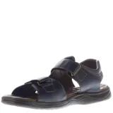 Sandalias de cuero marrón con diseño ergonómico, ajuste mediante tiras con velcro y suela de goma antideslizante.