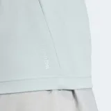 Remera deportiva Adidas Adi365 Essentials de color verde menta, con cuello redondo y mangas cortas. Cuenta con tecnología Climacool para la absorción del sudor, corte clásico y detalles reflectantes.