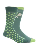 Par de medias de caña media color verde, con diseño estampado de pelotas de tenis y paletas de pádel. Presentan puntera y puño en un tono verde más claro.