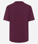 Remera de algodón con cuello redondo y mangas cortas, caracterizada por un bordado floral en relieve aplicado en el frente.