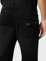 Pantalones vaqueros negros de corte recto, marca Philipp Plein.