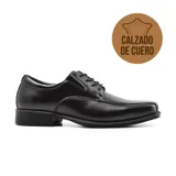 Zapato de vestir acordonado de cuero negro, con suela de goma y puntera cuadrada.