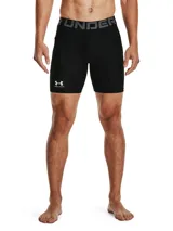 Short de compresión Under Armour de la línea HeatGear, diseñado para entrenamiento de alto rendimiento. Presenta un ajuste ceñido al cuerpo, cintura elástica ancha con logo de la marca, bolsillo lateral y logo reflectante en la pierna derecha.