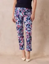 Pantalón de gabardina elastizada con estampado floral multicolor, pretina ancha elastizada y corte recto.