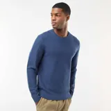 Sweater de punto fino con cuello redondo, diseño liso y mangas largas con puños acanalados.