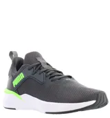 Championes deportivos Puma modelo Erupter, color gris con detalles en verde lima y suela blanca. Presentan una estructura de malla transpirable, refuerzos laterales sintéticos con el logo de la marca y cierre mediante cordones.