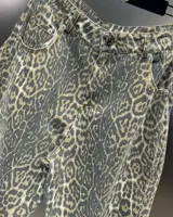 Pantalón palazzo de tiro alto con estampado animal print.