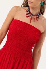 Vestido largo strapless rojo de lino imperial con nido de abeja elástico hasta la cintura y falda amplia.