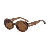 Lentes de sol unisex color marrón con marco ovalado de plástico reciclado y filtro UV400.