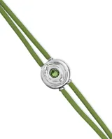 Pulsera de cuero verde doble con dije central en forma de ojo plateado con cristal verde.