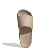 Chanclas tipo slide Adidas Adilette Lumia, color beige, con diseño ergonómico de una sola pieza, suela con ranuras flexibles y logo de la marca grabado en el lateral.