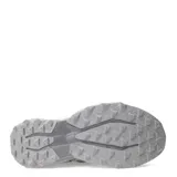 Championes de trail running New Balance modelo Tektrel, color gris con detalles en tonos más oscuros. Presentan un diseño robusto con suela AT Tread para mayor tracción, upper de malla transpirable con refuerzos sintéticos y cierre mediante cordones.