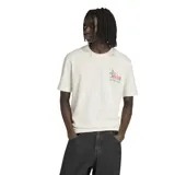 Remera de algodón color crema con cuello redondo y manga corta. Presenta un pequeño estampado gráfico en el pecho izquierdo inspirado en la mascota del Mundial México 86, con un balón y elementos florales.