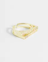 Set de dos anillos dorados con strass.