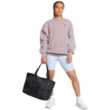 Bolso tipo tote Under Armour UA Studio Tote color negro, con amplio compartimento principal con cierre, asas dobles para el hombro y bolsillo frontal de malla con cremallera.