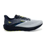 Championes Brooks Launch 10 para hombre, ideales para running en asfalto. Color gris con detalles en azul marino y amarillo.
