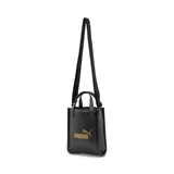 Bolso tote mini Puma Core Up, color negro con logo dorado estampado en el frente, doble asa corta y correa larga ajustable para el hombro.