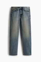 Jean de corte recto en denim de algodón rígido, con diseño de cinco bolsillos y acabado con efecto desgastado.