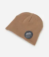 Gorro de punto doble faz con diseño tribal abstracto en tonos beige y marrón. Confeccionado en tejido acrílico suave, ofrece aislamiento térmico y un ajuste cómodo.