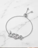 Pulsera de plata con dije de la palabra "hope" incrustado con circonias y cadena ajustable con cierre deslizante.