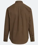 Camisa de manga larga confeccionada en sarga de algodón, con cuello clásico, cierre frontal abotonado y dos bolsillos frontales con solapa y botón.