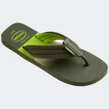 Ojotas Havaianas Urban Print con base verde militar y verde neón, tiras anchas bicolores con logo de la marca.