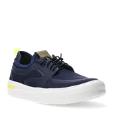 Championes urbanos Democrata modelo Ulie, color azul marino con detalles en amarillo neón. Presentan una estructura de malla transpirable con refuerzos sintéticos, sistema de cordones y suela blanca de goma con diseño texturizado.