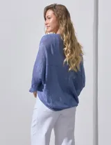 Cárdigan tejido color beige, marca Joseph A, de mangas largas y calado con motivos florales.