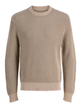 Sweater de punto plano con cuello redondo, mangas largas y calce holgado. Confeccionado en algodón, presenta un diseño clásico y versátil.