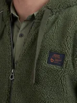 Campera de abrigo tipo fleece color azul marino, con cierre frontal completo y cuello alto.