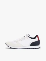Zapatillas deportivas Tommy Hilfiger blancas, con detalles en azul marino y rojo.