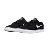 Championes de skate Nike SB modelo Zoom Janoski OG, color negro con el logo swoosh bordado en blanco y suela de goma vulcanizada blanca.