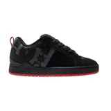 Championes de skate DC modelo Court Graffik, color negro con detalles en gris oscuro y suela roja. Presentan el logo de la marca en el lateral y un diseño robusto con cordones.