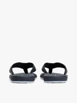 Ojotas Tommy Hilfiger azul marino con logo de la marca en la tira.