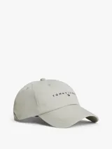 Gorra de seis paneles color beige claro, confeccionada en algodón orgánico, con visera curva y logo bordado de Tommy Jeans en el frente.
