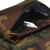 Mochila Vans Old Skool H2O con estampado de camuflaje en tonos verde, marrón y negro.